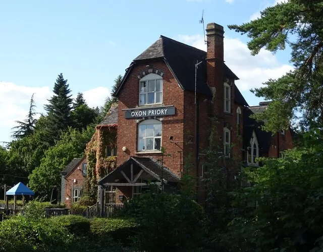 The Oxon Priory at Shelton Corner in September 2024, before it closed and before the fire. The gabled brick range is the original Victorian vicarage