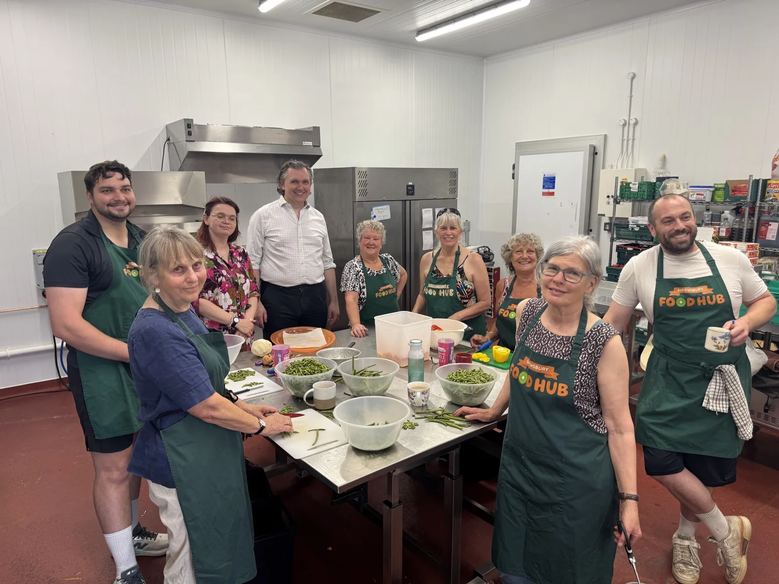 Shrewsbury Food Hub volunteers and staff in the charity's kitchen, in the photograph Shrewsbury Town Council issued with its grant announcement